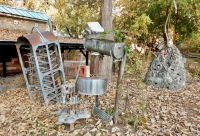 Industrial drying rack, junk construction and mound of snakes, Howard Finster's Paradise Garden, 2016. There are drying racks scattered around the garden. Finster delighted into turning other people's debris into art for the glory of God