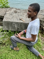 At work on a butterfly. Made during May 27, 2024, carving day. Chicago lakefront stone carvings, Promontory Point. 2024