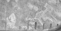 Hannah face and Save the Point, made during the May 28, 2022, Promontory Point carving workshop, with "Hannah" added Oct. 9. Chicago Lakefront stone carvings, Promontory Point. 2022