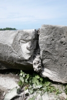 Face carving by Joel Cardenas during his carving workshop, May 28, 2022. Chicago lakefront stone carvings, Promontory Point. 2022