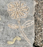 Flower, AL, made during the Oct. 9, 2022, Promontory Point carving workshop. Level 5. Chicago Lakefront stone carvings, Promontory Point. 2023