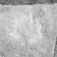 Sun shape made during May 28, 2022, carving day. Level 5. Chicago lakefront stone carvings, Promontory Point. 2022