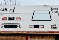 Pulaski Auto Supply in Chicago has remained steadfast in its reliance on hand-painted imagery.-Roadside Art
