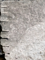 JE +, J.M. Chicago Lakefront stone carvings, south of La Rabida Hospital. 2025