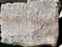 J, R.J.I., BM, CK, UF, R, heart. Chicago Lakefront stone carvings, south of La Rabida Hospital. 2025