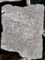 AP+EW, Fred Grovic 38, L, JA, EP, Cale, Chink. Fred graduated from Lindblom High School in January 1938. Lindblom is in the West Englewood neighborhood. Under Fred's name there appears to be a large T containing the letters S and U. Flip it and it is rather phallic. Chicago lakefront stone carvings, south of La Rabida Hospital. 2025