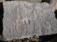 Swastika, deep cut shapes. Chicago Lakefront stone carvings, south of La Rabida Hospital. 2025