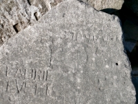 Autograph rock: Karole, Laurie Evett (detail), W, HI, BB, LD, others. Chicago Lakefront stone carvings, south of La Rabida Hospital. 2025