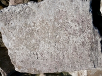 Red Erick, Sammy (mispelled?). Chicago Lakefront stone carvings, south of La Rabida Hospital. 2025