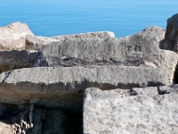 T.D., undeciphered letters. Chicago lakefront stone carvings, south of La Rabida Hospital. 2025