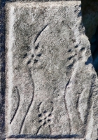 Odd figure, detail, from 12-panel carving. Chicago Lakefront stone carvings, south of La Rabida Hospital. 2025