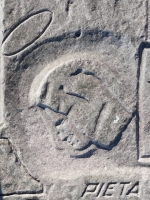 Profile with halo, Pieta, from 12-panel carving. Chicago Lakefront stone carvings, south of La Rabida Hospital. 2025