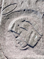 Profile with halo, from 12-panel carving. Chicago Lakefront stone carvings, south of La Rabida Hospital. 2025