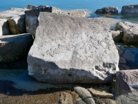 M Flood. Chicago Lakefront stone carvings, south of La Rabida Hospital. 2025