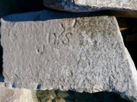 J, AS, V. Chicago Lakefront stone carvings, south of La Rabida Hospital. 2025