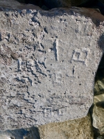 Autograph rock detail: J, JO, Chuck W, J, A S(?)rtich, SK, DM, Daly, 47, SHE, EJ. Chicago Lakefront stone carvings, south of La Rabida Hospital. 2025