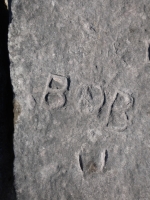 Autograph rock detail: JI, Bob, K, G.T., C, Ray, Babe, W, K, Shorty, Pegleg, Bart, Ray, others. Chicago lakefront stone carvings, south of La Rabida Hospital. 2025