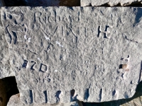 Autograph Rock: Richard Wine, HE, the Swede, AI, Tom, DIM, JK, OZE, LAM, M-7. Chicago lakefront stone carvings, south of La Rabida Hospital. 2025