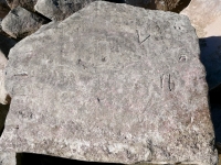 V, A, 16 (or 91). Chicago Lakefront stone carvings, south of La Rabida Hospital. 2025