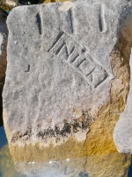 Nick, T, SV. Chicago lakefront stone carvings, south of La Rabida Hospital. 2023