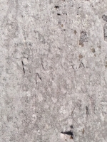 R^C, T.A. Chicago Lakefront stone carvings, south of La Rabida Hospital. 2025