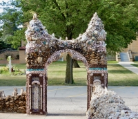 Grotto gate facing the church, Father Paul Dobberstein's Grotto of the Redemption, West Bend, Iowa, 1912-1954