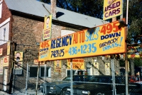 The entire site was a canvas. Regency Auto Sales automotive art environment, Western Avenue at 75th Street. Photos circa 1990
