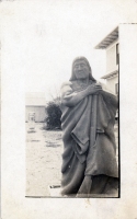 Indian holding a rifle sculpture postcard