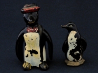 Penguins were an ever popular shape for S&Ps and toothpick holders. These two traveled some rough roads to finally come together.