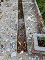 Mosaic sidewalks with drainage channel, Howard Finster's Paradise Garden, 2016