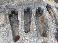 Monks' graves dug into the stone, Abbey of Saint-Roman