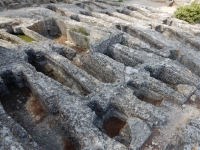 Monks' graves dug into the stone, Abbey of Saint-Roman