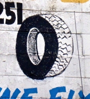 Rudy's Tire Shop sign, tire detail