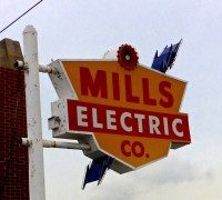 Mills Electric Co. sign, with lightening bolt