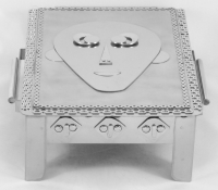 Stanley Szwarc stainless steel face box with undecorated face, front view