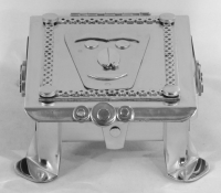 Stanley Szwarc stainless steel face box with big eyebrows, front view