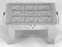 Stanley Szwarc stainless steel face box with nine  mouse or bear faces, front view