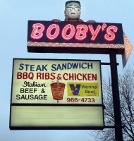 Booby's triple-threat sign: gyros, neon and a dead ringer for the late Illinois Sen. Paul Simon. Milwaukee Avenue, Niles