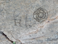 Letters and symbol at the Waikoloa petroglyphs