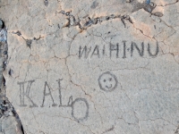 Words and a smiley face at the Waikoloa petroglyphs
