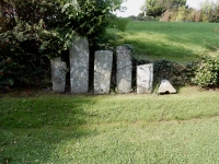 Old grave markers, St. Caffo's Church, Llangaffo, Wales