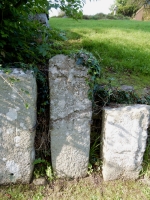 Old grave markers, St. Caffo's Church, Llangaffo, Wales
