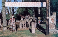 Color view of sign and sculptures at Fred Smith's Wisconsin Concrete Park,  Phillips, postcard
