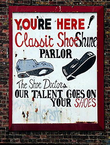 Sign with shoes for Classit ShoeShine Parlor
