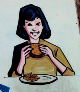 Woman eating hamburger, Diane's Truck Stop