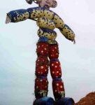 Giant sculpture of man from barrels