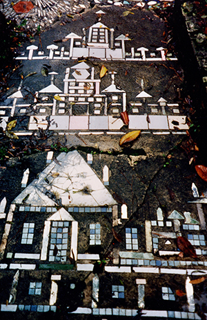 Howard Finster Paradise Garden sidewalk with mosaics of buildings, photographed circa 1990